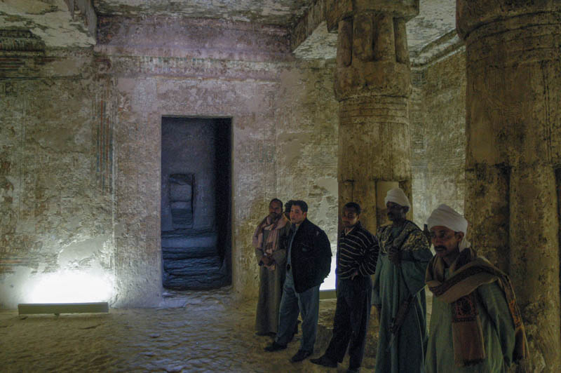 The crowd of guides, guards, egyptolotists, and hangers-on in the tomb
