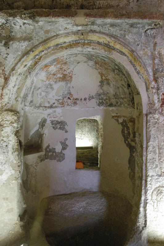 a very odd arched recess in the tomb