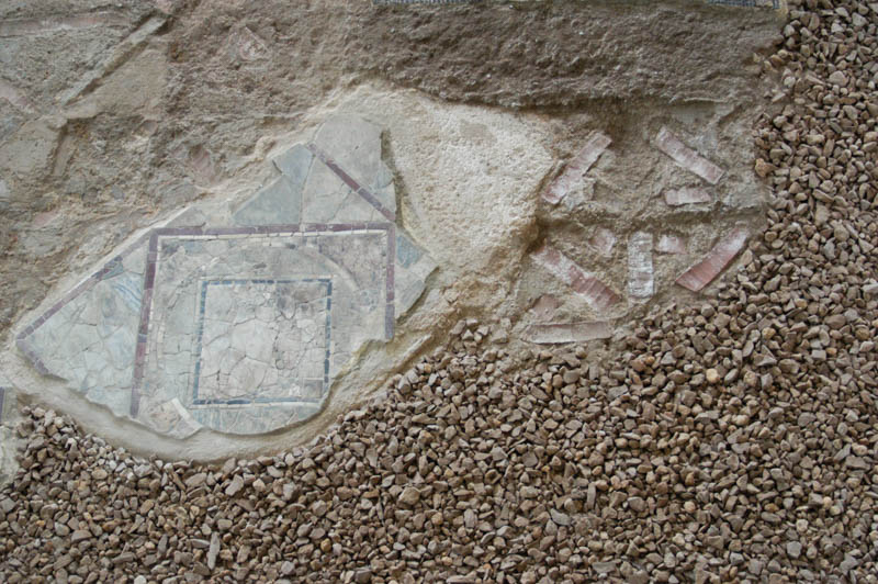 faint colors on an ancient tile