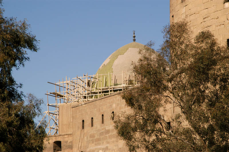 The peeling greenish dome of the Nasr Mohammed Mosque