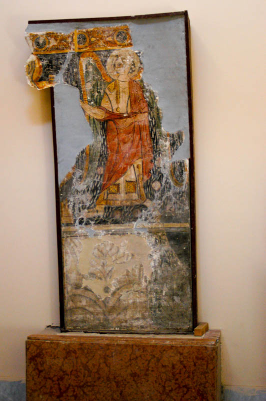 a painted plaster fresco, much damaged