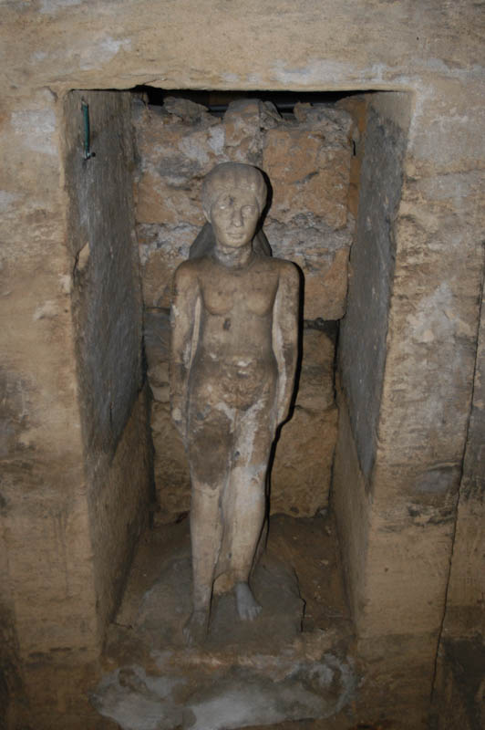 Roman statue in an egyptian style, near the tomb