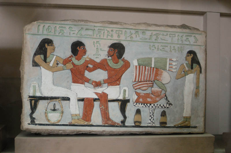 A feasting scene in plaster from the stele of Amenemhat