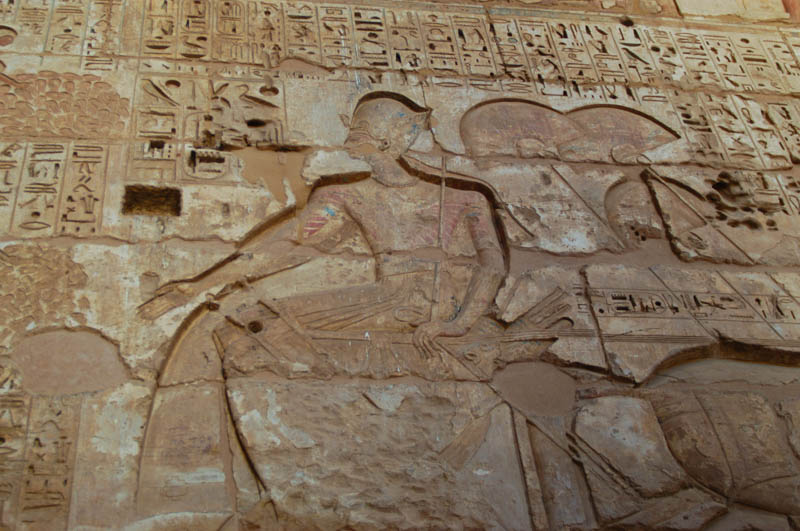 The king, in a war crown -- the deep carving is Ramses II