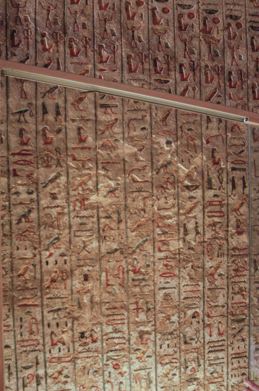 Walls of heiroglyphs on plaster in the tomb