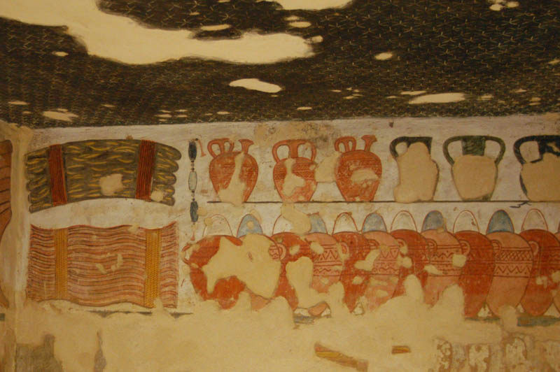 Display of jars and offerings in the tomb