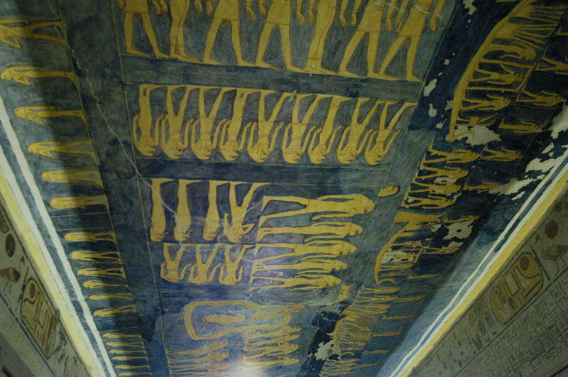 The dark blue ceiling and golden figures