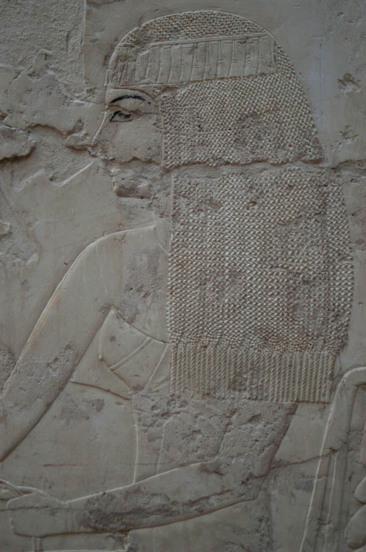 Detailed hairstyles abound in the tomb
