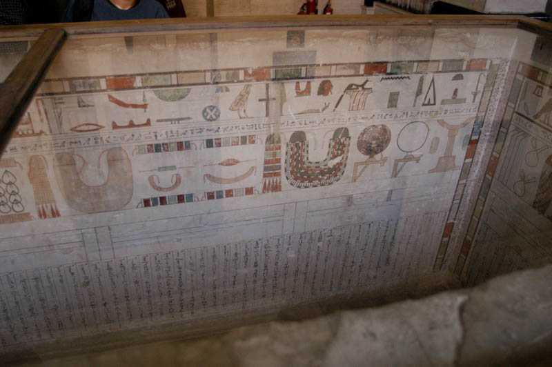 Inside of a decorated sarcophagus