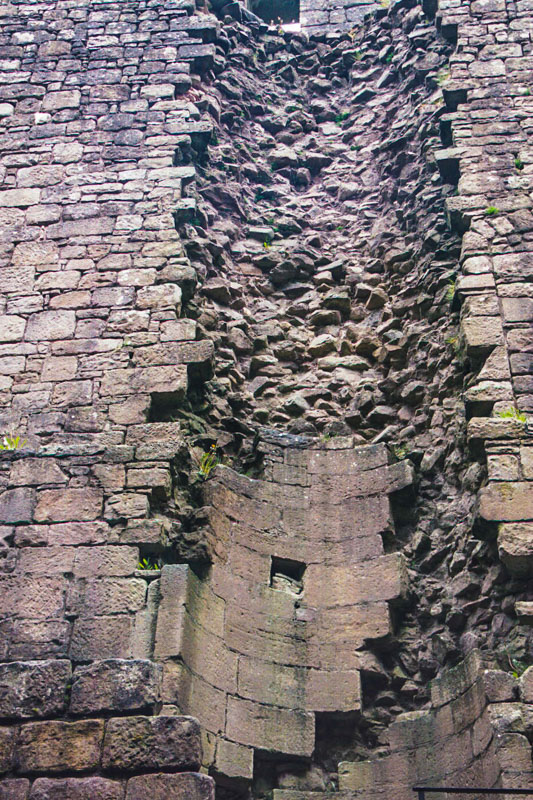 a small stair tower built into the wall, completely collapsed