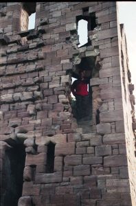 Danger-boy climbing around in the ruins