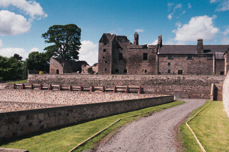 the castle from the large terraced garden ; the bracing for the sagging wall is still in place