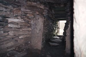 inside a reconstructed stone pile cairn