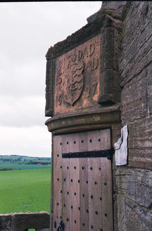 The dated stone over the doorway